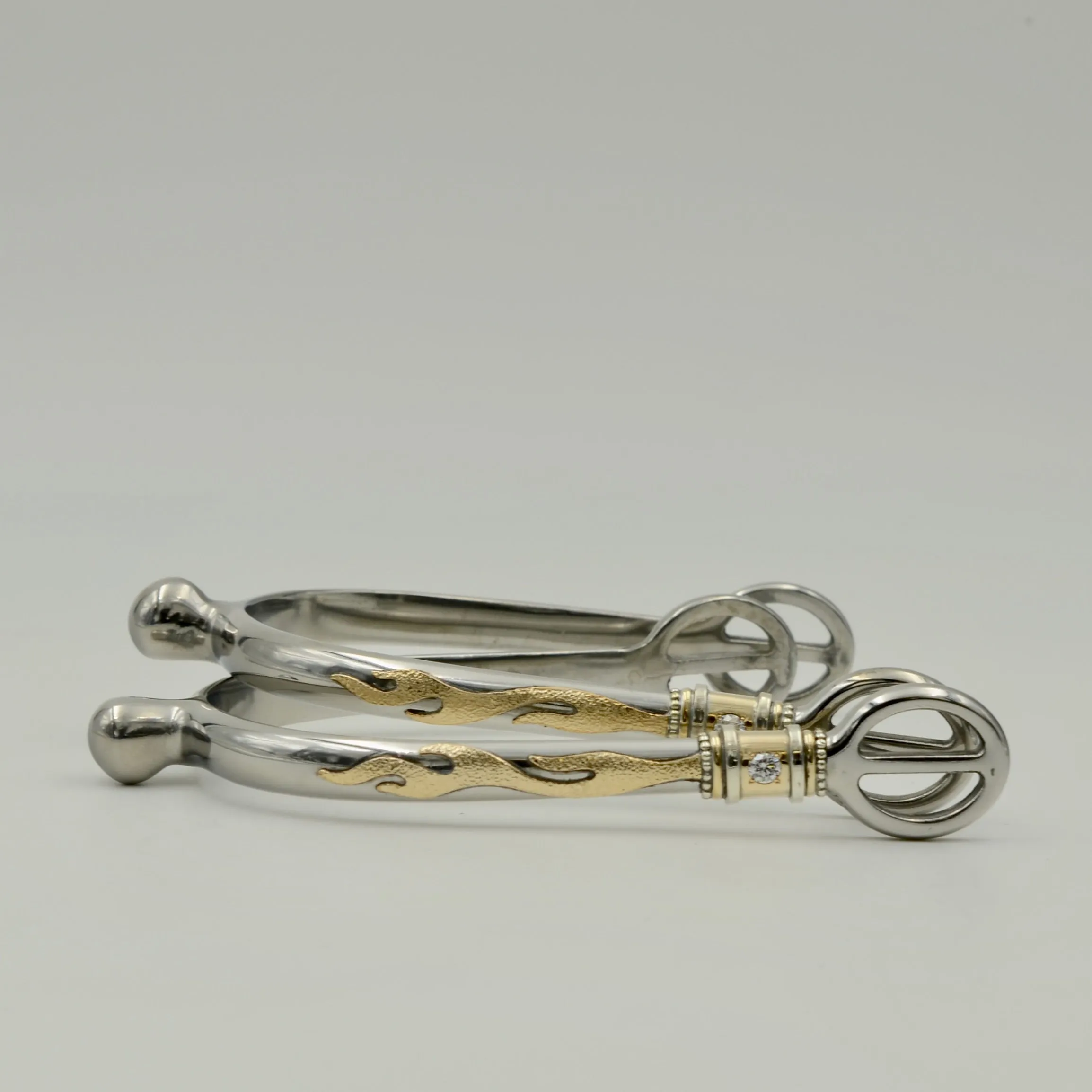 Flaming English Spurs With Gold Band and Stone